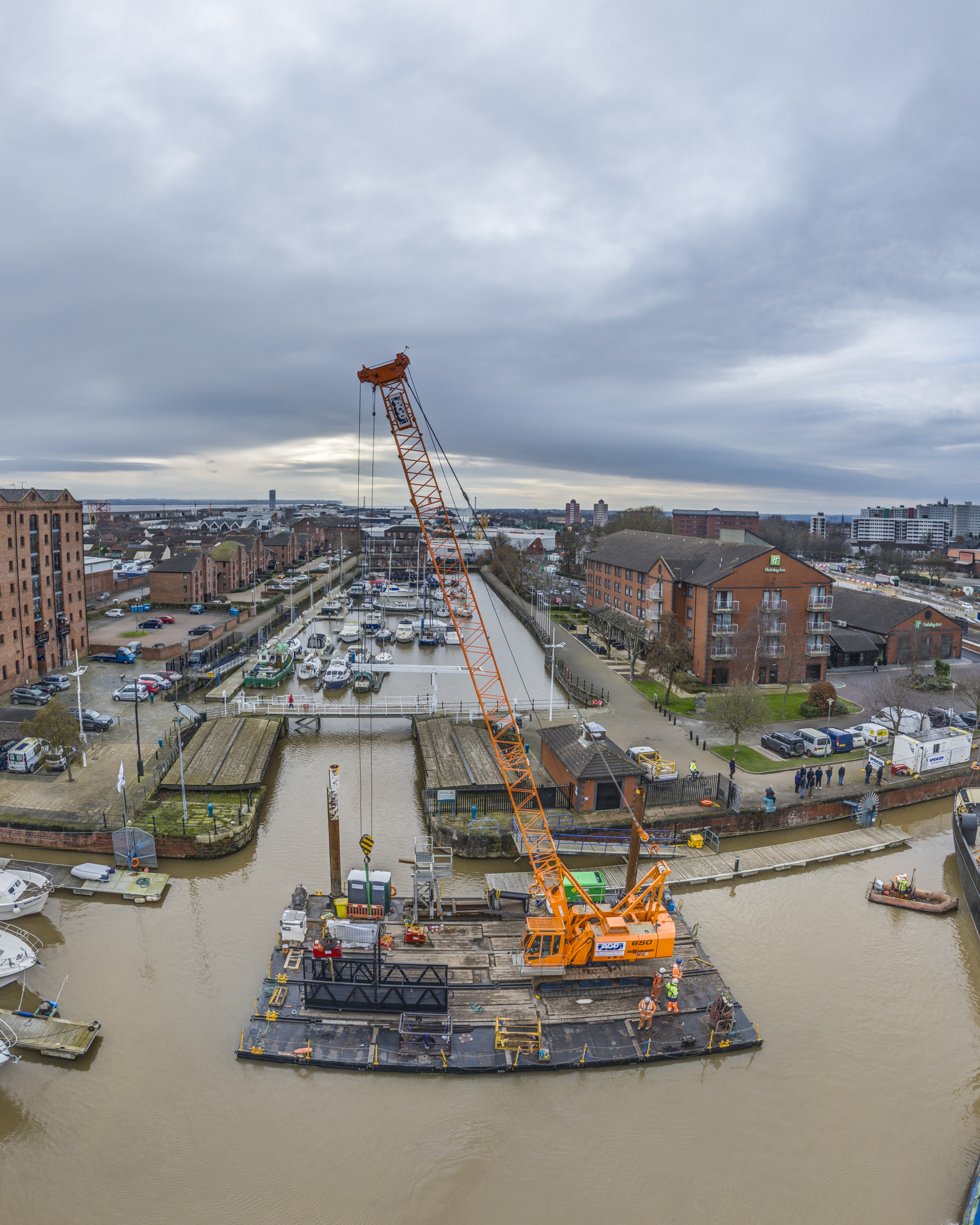 Sennebogen 650HD crawler crane on barge