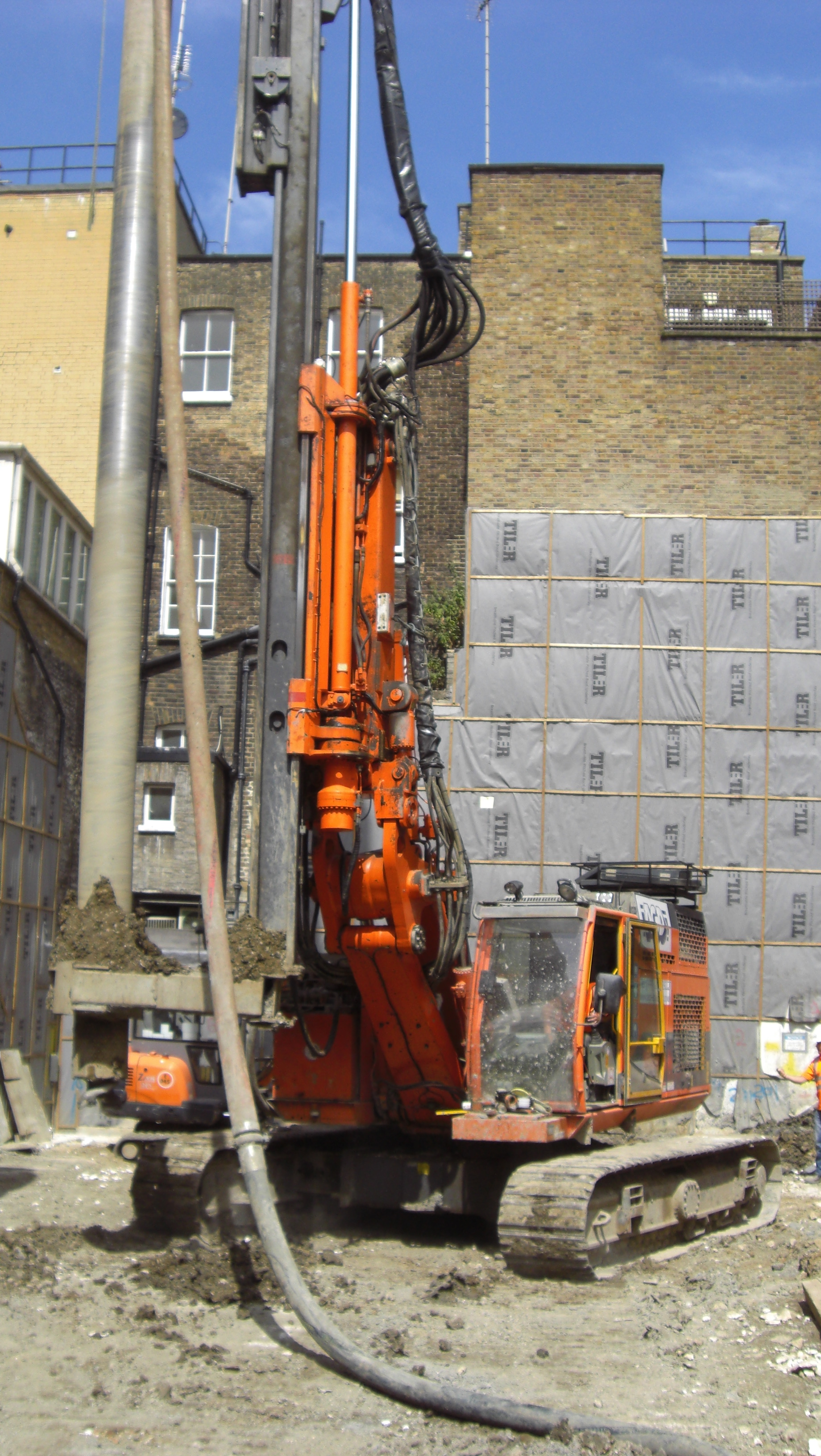 RTG RG16T with twin rotary installing secant wall in Mayfair for Keller